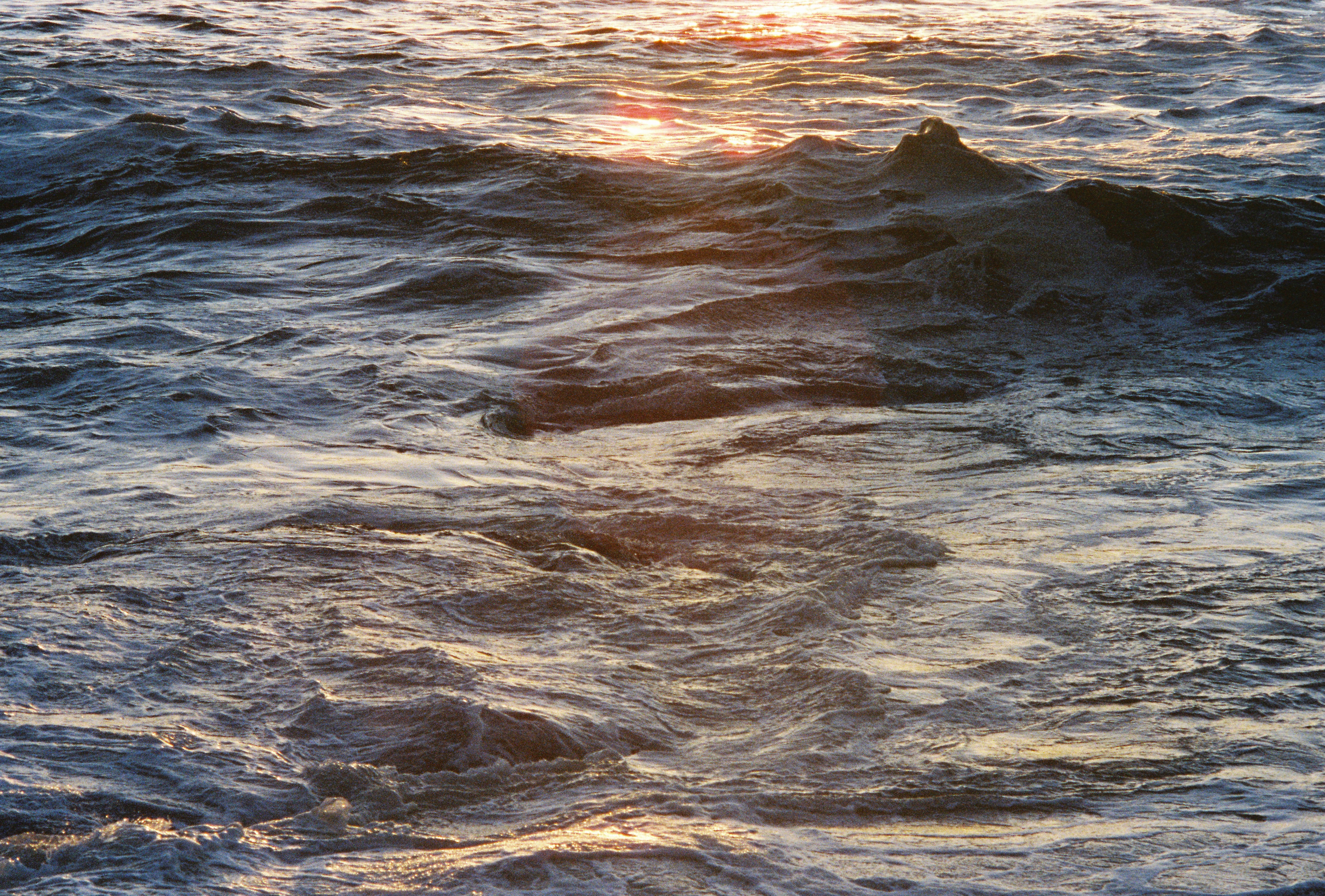 ocean waves breaking on shore